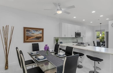 Dining space with recessed lighting, a ceiling fan, and an office area