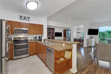 Kitchen with appliances with stainless steel finis