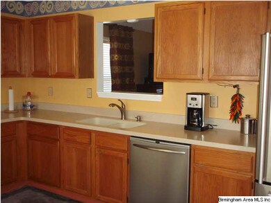A large kitchen featuring New Corian Countertops! 