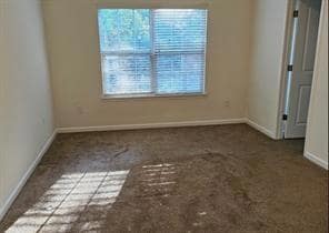 Spare room with baseboards