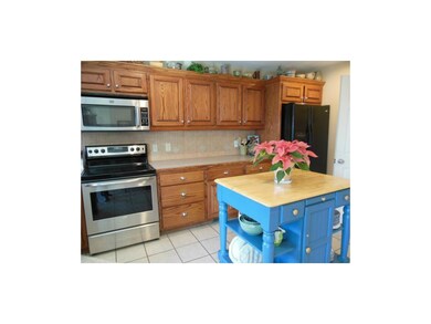 Stainless steel stove and microwave.