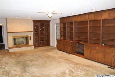 Plenty of built in cabinets and shelves