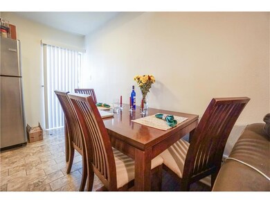 Dining room featuring stone finish floor