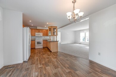 Open concept kitchen, dining, and living room
