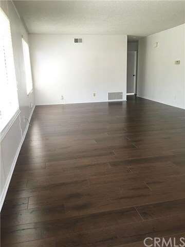 FAMILY ROOM OVERLOOKS LARGE BACK YARD AND VERY BRI
