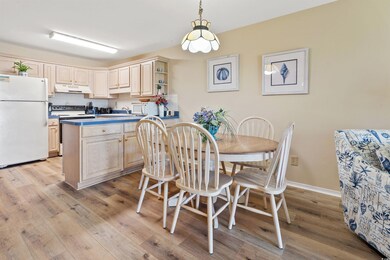 Dining area featuring light wood-type flooring and