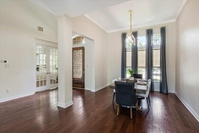 The inviting entryway offers high ceilings and roo