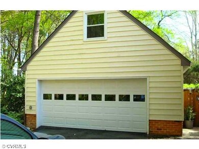 Parking Lot/Garage - 2.5  car garage with room abo
