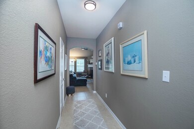 The hallway with storage closets, leads to the spa