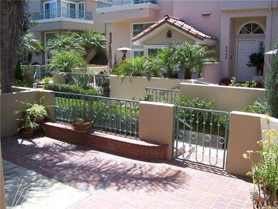 Sunny patio faces walkway