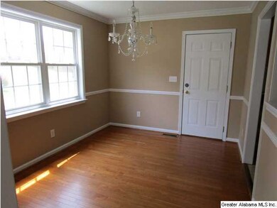 FORMAL DINING ROOM HAS HARDWOOD FLOORS