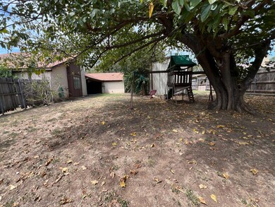 View of yard with a playground