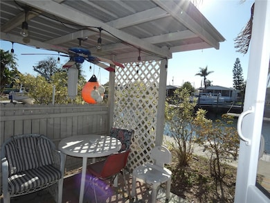 Waterfront cottage patio .