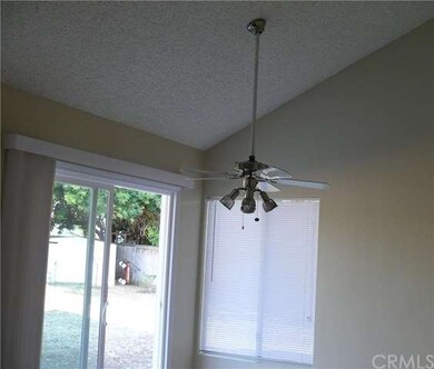 HIGH CEILINGS WITH CEILING FAN AND THE SLIDER TO T