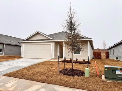 Ranch-style home featuring a garage
