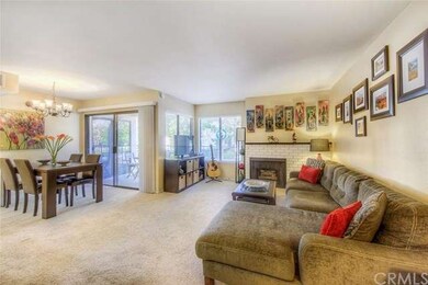 The living and dining areas open onto the balcony