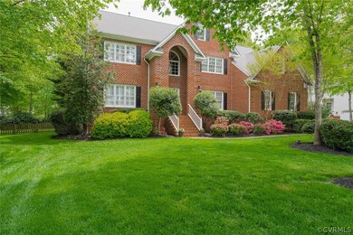 Well landscaped, mature plantings, night lighting