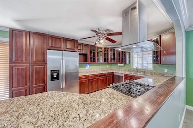 Kitchen with appliances with stainless steel finis