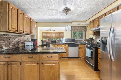 Granite counters, stainless appliances, ample cabi