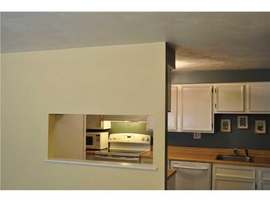Kitchen. A nice pass through from the dining room 