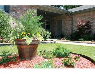Exterior Front. This yard is gorgeous. You will be the envy of the neighborhood!