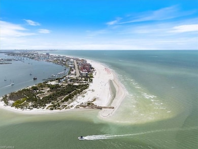 100 Estero BLVD #633_Drone / aerial view of waterfront with a beach