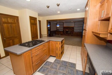Island with gas cook top.