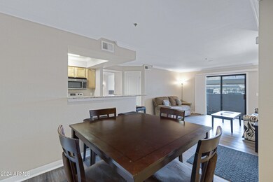 Dining room view to living room & patio