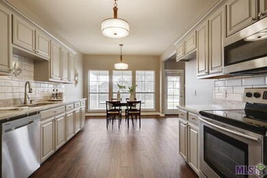 Airy kitchen over looking the water, lots of windo