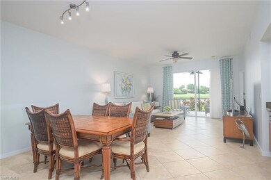 Dining area featuring track lighting, ceiling fan,