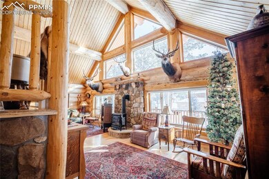 Vaulted ceilings with a wall of windows as you wal