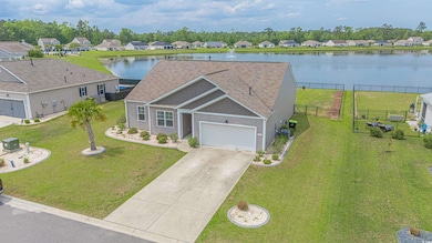 View of front of home with fence, a residential vi