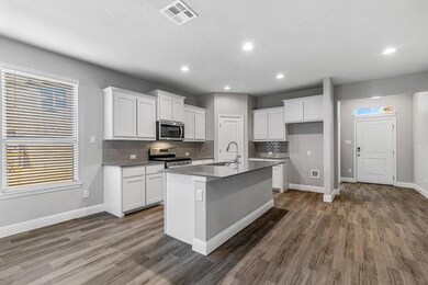 Kitchen - All Home and community information, including pricing, included features, terms, availability and amenities, are subject to change at any time without notice or obligation. All Drawings, pictures, photographs, video, square footages, floor 