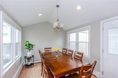 Dining room with vaulted ceilings