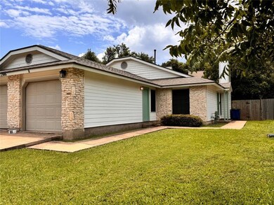 Ranch-style home with a shingled roof, stone sidi