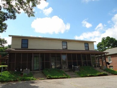 Rear view with screened porch each unit
