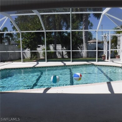Large heated pool. Entire back yard privacy fence. Flowering trees.