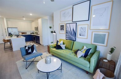 Living room featuring light hardwood / wood-style 