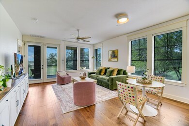 Living area featuring plenty of natural light, ce