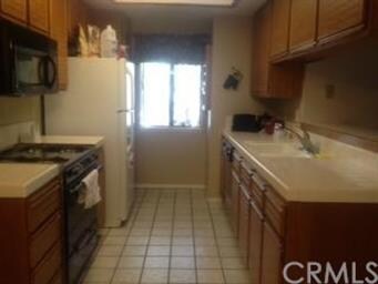 Gourmet kitchen with a window to get a nice breeze