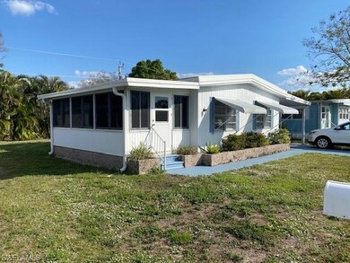View of home's exterior with a lawn