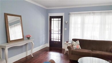 Original Front door into large Living Room with gl
