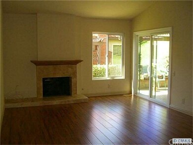 Living Room with modern fireplace and new vinyl wi