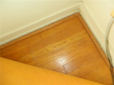 The corners of the carpet are picked up in most of
