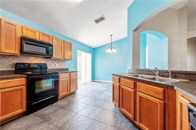 SPACIOUS KITCHEN.