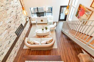 Wood Flooring Throughout the Loft, Exposed Brick, Recessed Wall Mounted Electric Fireplace...