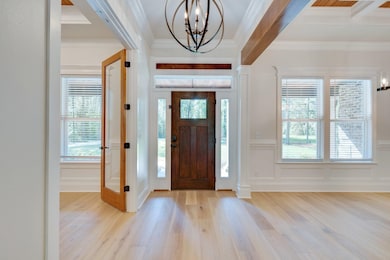Beautiful entry with office directly to the right