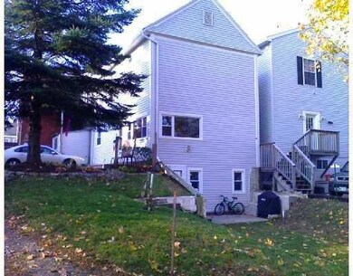 Exterior Back. Back of unit with patio