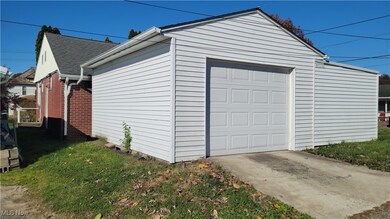 Garage with concrete driveway