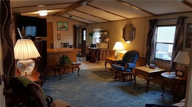 Enter the home to see the open Family room and eat